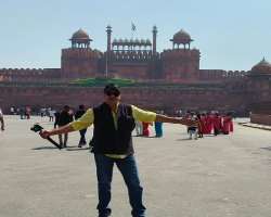 Besides acting and food, he also has one more passion, which is to travel. He shared a picture of him in front of <a href=